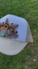 Load and play video in Gallery viewer, Feather Trucker Hat with Turquoise bead, Woman&#39;s Western Cowgirl Foam Snapback w/ Rope detail, Boho Rodeo Cap, Pheasant Feather Mesh Back
